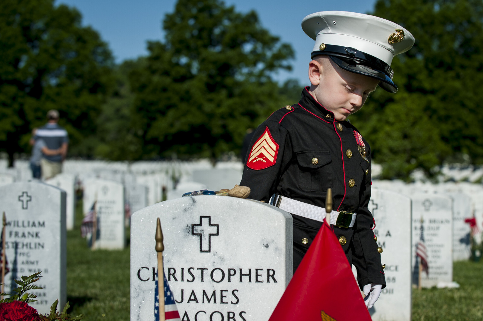 On Memorial Day, Christian Jacobs, 4, of Hertford, NC, walks past the headstone of his father, Marine Sgt. Christopher Jacobs, in Section 60 at Arlington National Cemetery in Arlington, Virginia, USA, on 25 May 2015. (Pete Marovich/ European PressPhoto Agency)