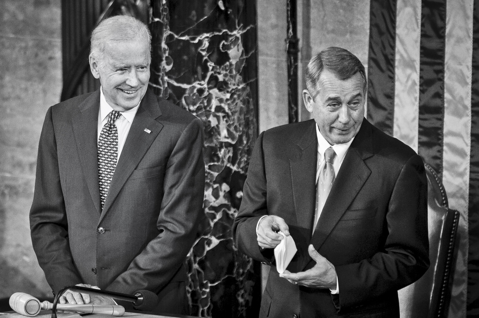 Vice President Joe Biden looks on as Speaker of the House John Boehner shows that he has a handkerchief ready for any tears he may shed as Pope Francis speaks to a joint meeting of Congress at the U.S. Capitol in Washington, District of Columbia, U.S., on Thursday, Sept. 24, 2015. Credit: Pete Marovich/Bloomberg