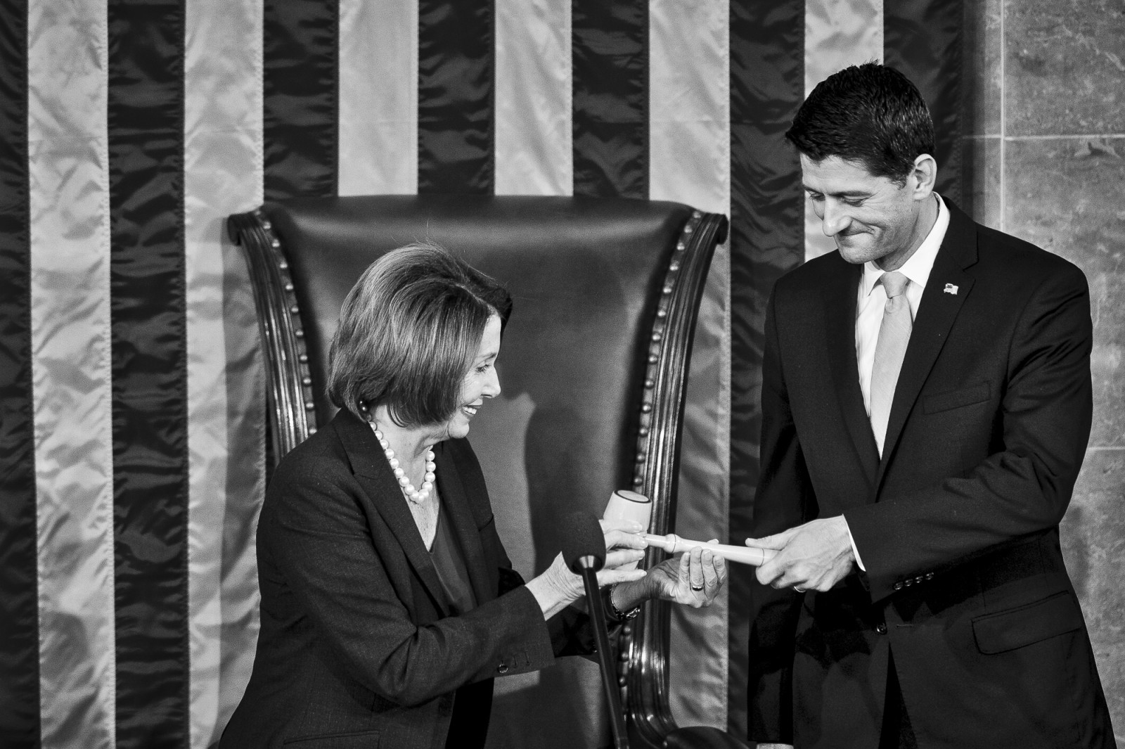 Democratic Minority Leader Nancy Pelosi passes the gavel to the 62nd Speaker of the House, Paul Ryan (R-WI) on October 29, 2015 in Washington, D.C. Earlier the outgoing Speaker, Rep. John Boehner (R-OH), gave his farewell address to Congress. He is retiring on October 30, 2015. Photo by Pete Marovich/UPI